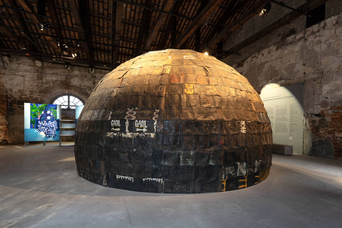 Installation view of Everything Precious Is Fragile in the first-ever Benin Pavilion, with works by Chloé Quenum, Moufouli Bello, Ishola Akpo, and Romuald Hazoumè (photo by Andrea Avezzù, courtesy La Biennale di Venezia)